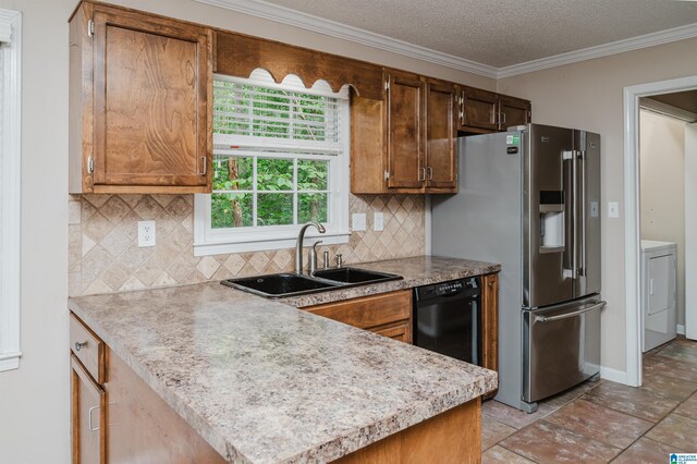 kitchen featuring a textured ceiling, dishwasher, backsplash, kitchen peninsula, and sink