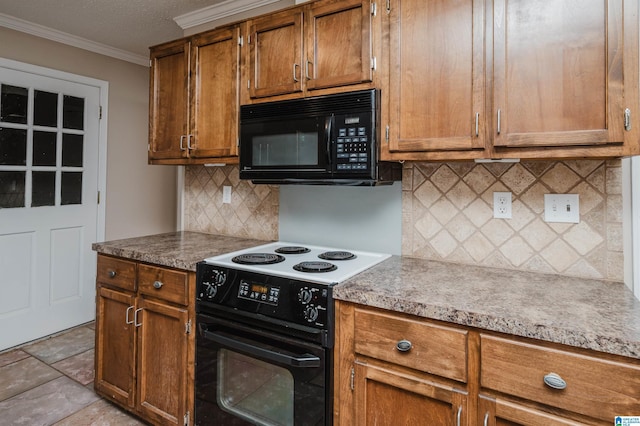 3424 Oakdale Dr, Vestavia Hills, AL 35223 - kitchen with brown cabinetry, black appliances, and crown molding