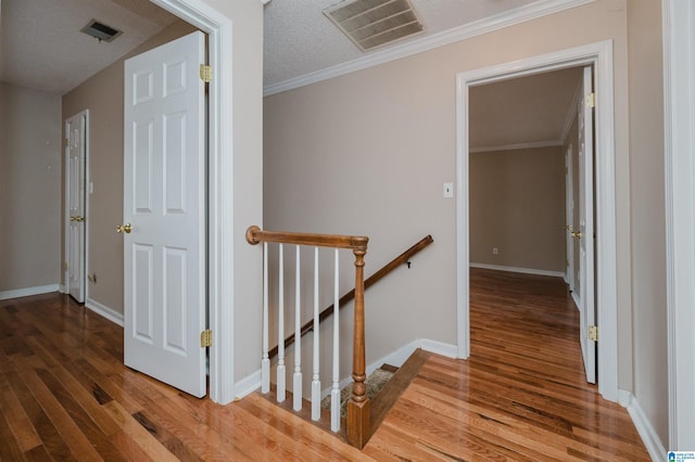3424 Oakdale Dr, Vestavia Hills, AL 35223 - stairway with visible vents, baseboards, and wood finished floors