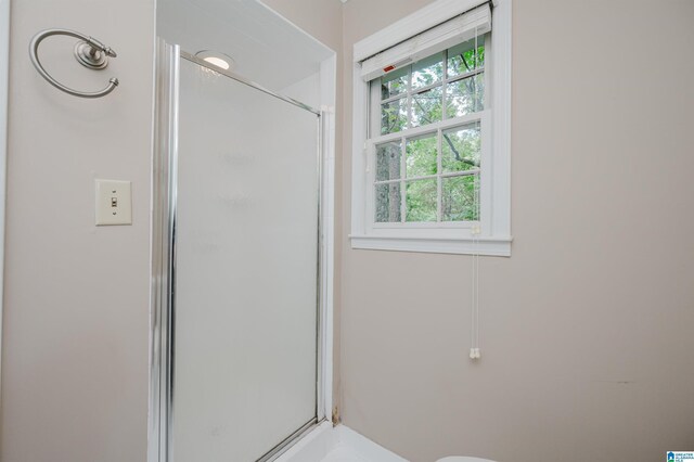 bathroom with an enclosed shower