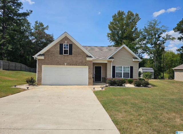 view of front of house featuring a front yard and a garage