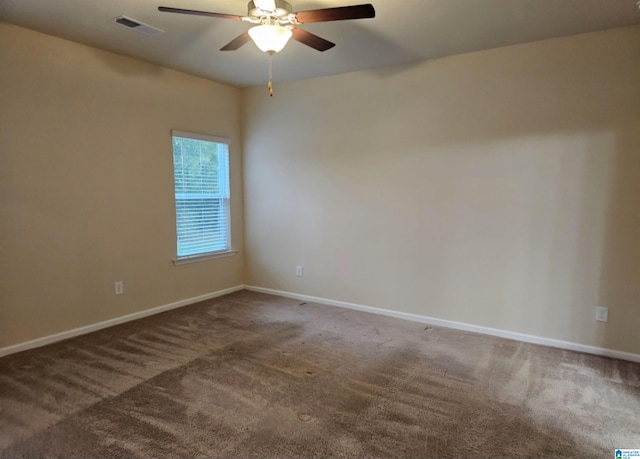 carpeted empty room with ceiling fan