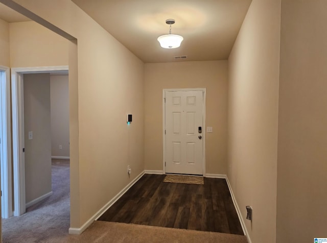 doorway featuring dark hardwood / wood-style flooring