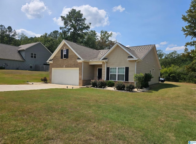 view of front of house with a garage and a front lawn