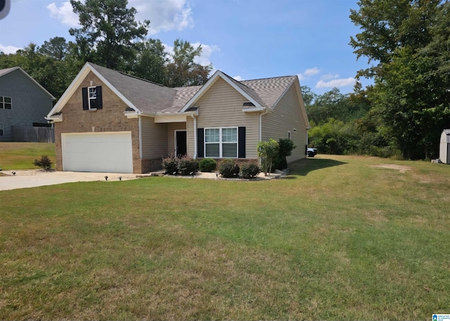 view of front of house with a front yard and a garage