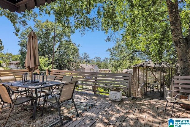 wooden terrace with a gazebo