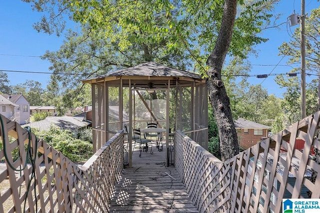 wooden deck featuring a gazebo