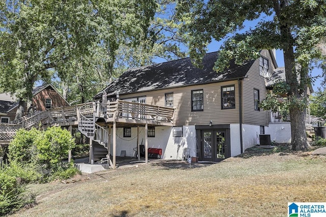 949 44th St, Birmingham, AL 35208 - rear view of house featuring stairs, french doors, a deck, central AC, and a yard