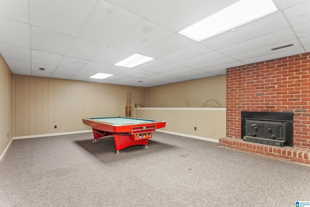 rec room with a fireplace, carpet flooring, pool table, and a drop ceiling