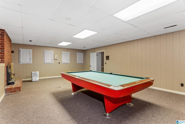 game room featuring a paneled ceiling, billiards, carpet, and a brick fireplace