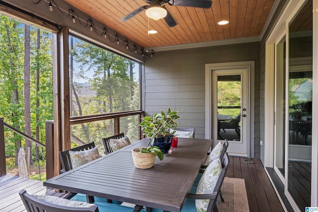 sunroom with wood ceiling, ceiling fan, and a wealth of natural light