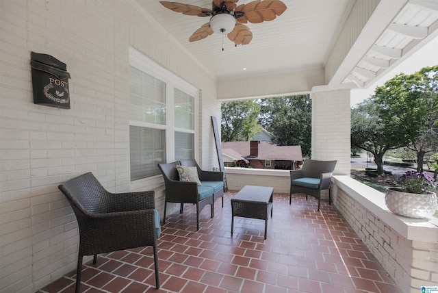 view of patio with ceiling fan and an outdoor hangout area