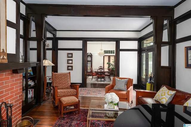 sunroom / solarium featuring an inviting chandelier and french doors