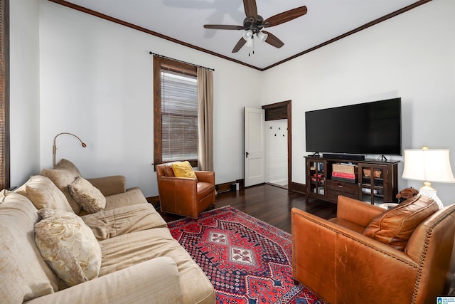 living area with crown molding, baseboards, a ceiling fan, and wood finished floors
