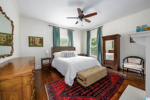 bedroom with dark wood-type flooring, a ceiling fan, baseboards, and ornamental molding
