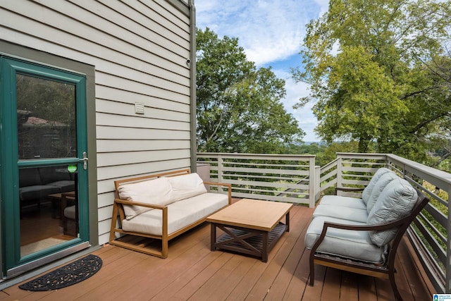 wooden terrace featuring outdoor lounge area