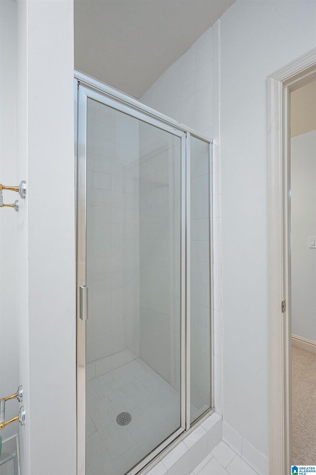 bathroom featuring walk in shower