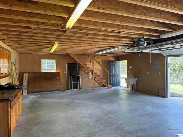 garage with electric panel and sink