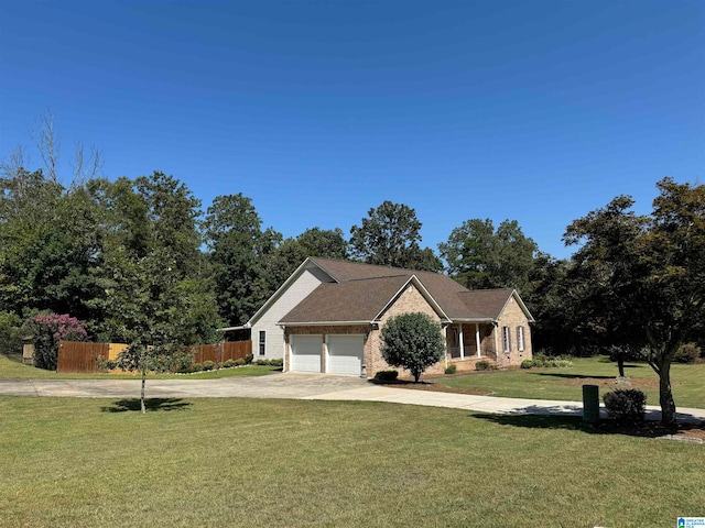 ranch-style home with a garage and a front yard