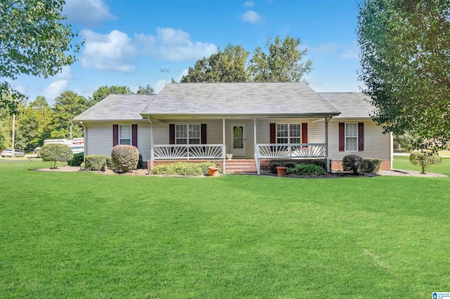 ranch-style house with a front lawn and covered porch