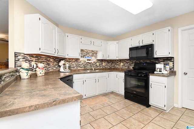 kitchen featuring black appliances, backsplash, sink, and white cabinets