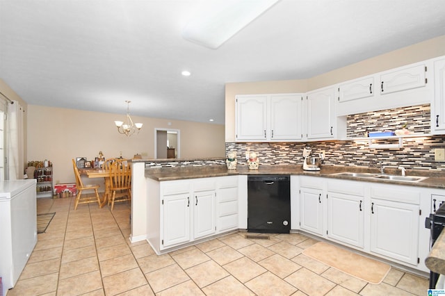 kitchen featuring dishwasher, an inviting chandelier, backsplash, and white cabinetry