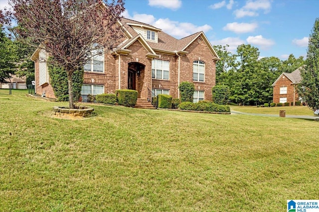 view of front of home with a front yard