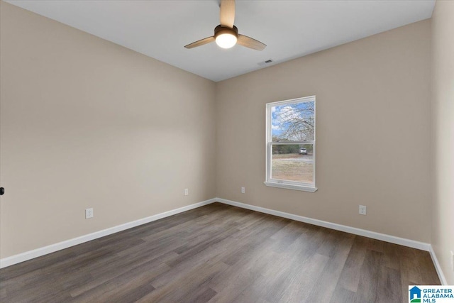 unfurnished room with hardwood / wood-style flooring and ceiling fan