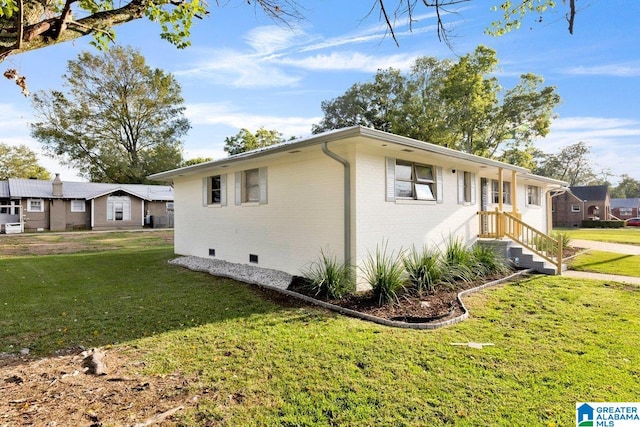 view of home's exterior featuring a yard