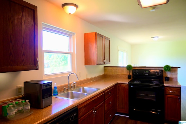 kitchen featuring black appliances and sink