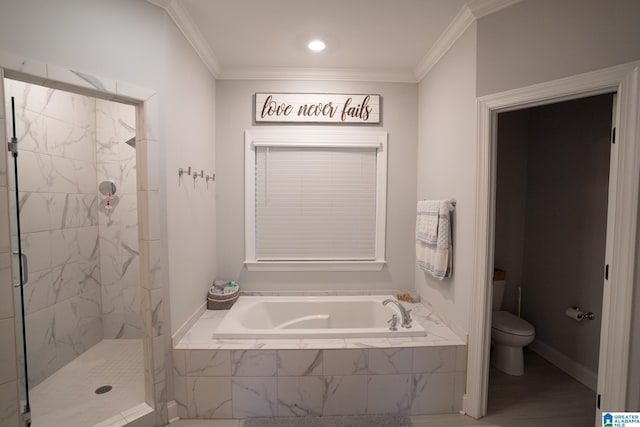 bathroom featuring crown molding, shower with separate bathtub, and toilet