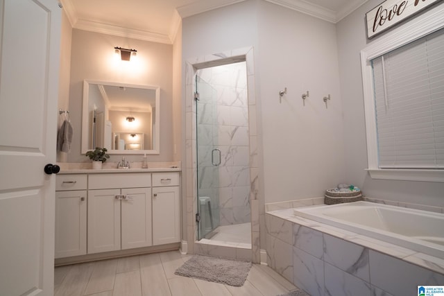 bathroom with tile patterned flooring, vanity, crown molding, and independent shower and bath