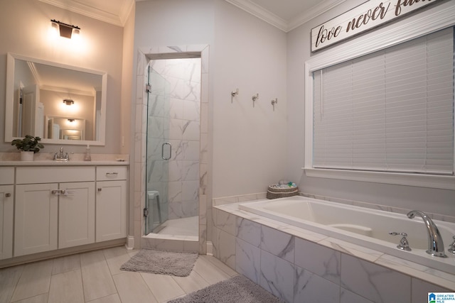 bathroom featuring tile patterned flooring, vanity, separate shower and tub, and crown molding