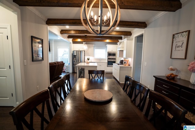 dining room featuring beam ceiling, dark wood-type flooring, crown molding, and a chandelier