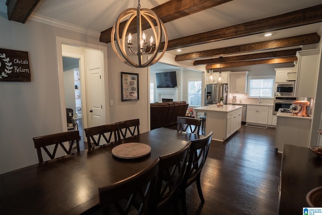 dining area with sink, crown molding, dark hardwood / wood-style floors, a notable chandelier, and beam ceiling