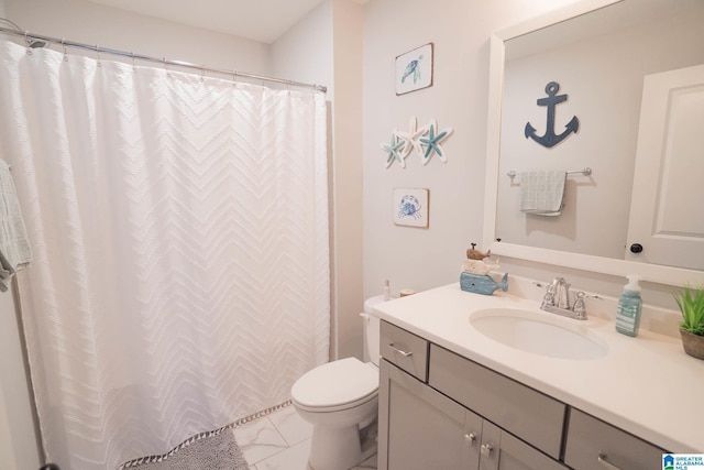 bathroom featuring walk in shower, vanity, and toilet