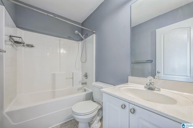 full bathroom featuring tile patterned flooring, vanity, toilet, and shower / washtub combination