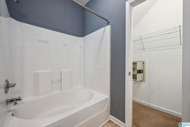 bathroom featuring shower / washtub combination