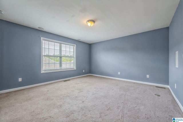 spare room with carpet flooring