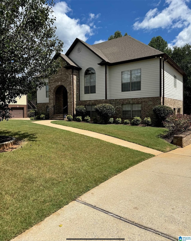 view of front facade with a front lawn