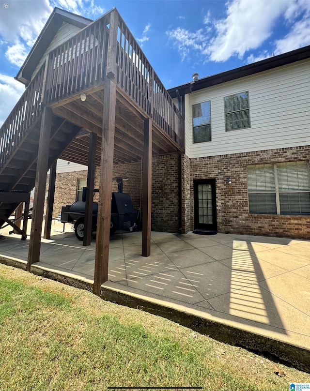 view of patio / terrace featuring a wooden deck