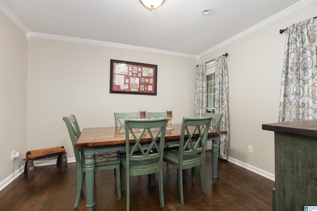 dining space featuring ornamental molding and dark hardwood / wood-style floors