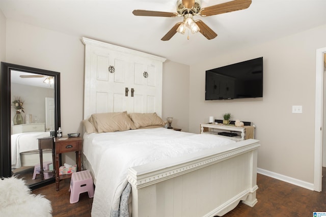 bedroom with ceiling fan and dark wood-type flooring