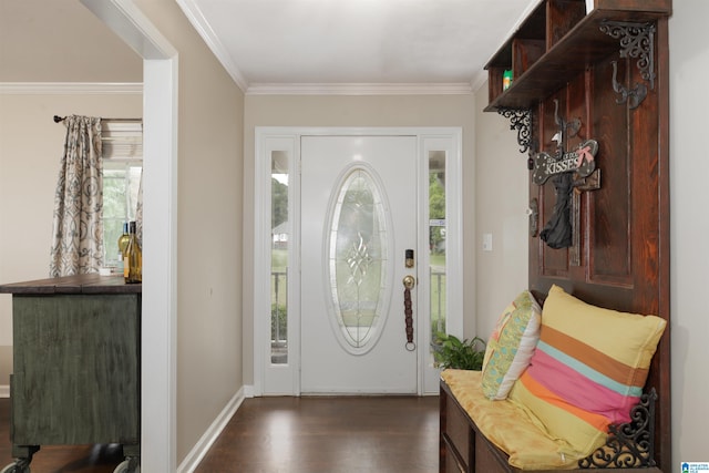 entryway featuring ornamental molding and dark hardwood / wood-style flooring