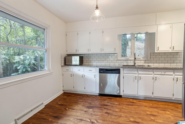 kitchen featuring dark hardwood / wood-style flooring, pendant lighting, stainless steel dishwasher, a baseboard heating unit, and white cabinets