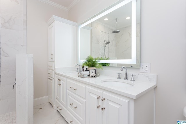 bathroom with tiled shower, crown molding, and vanity