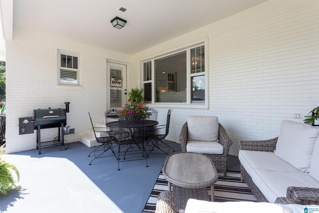 view of patio featuring grilling area and outdoor lounge area