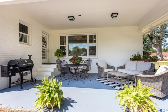 view of patio / terrace with grilling area and an outdoor hangout area