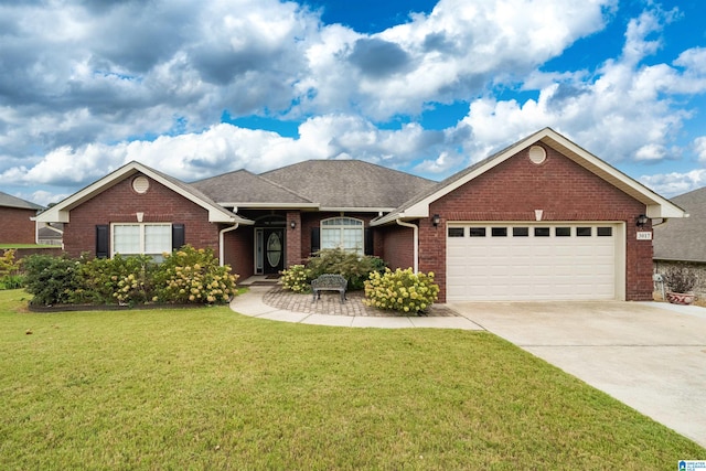 single story home with a garage and a front yard