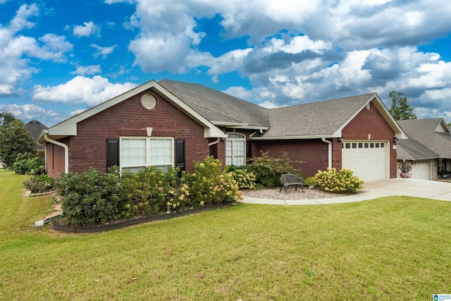 single story home with a garage and a front lawn